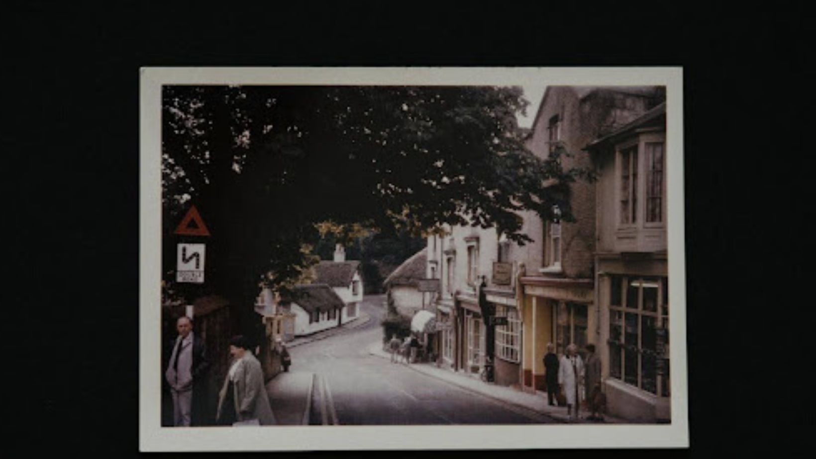 An old photograph of a street.