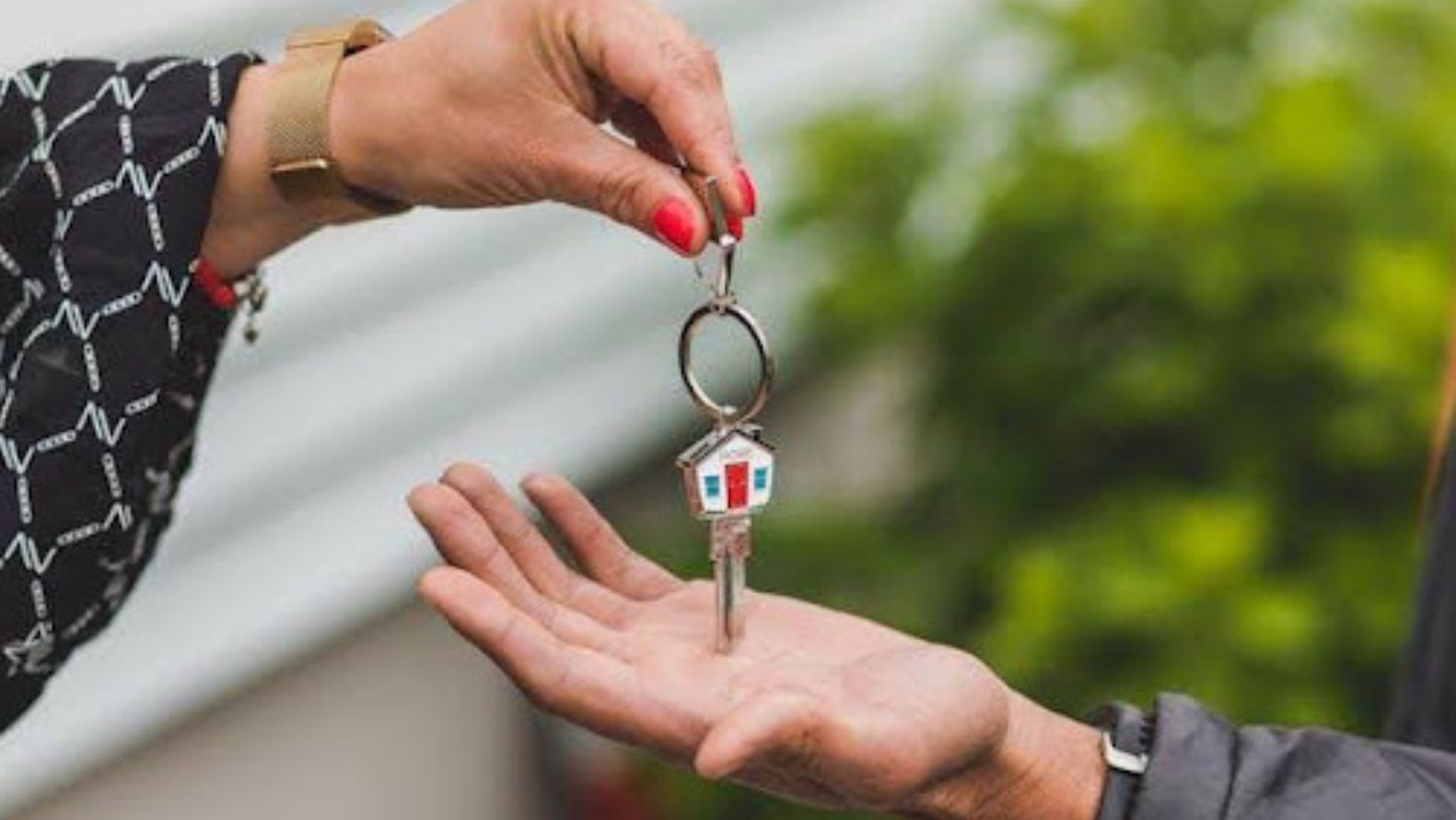 A person holding keys