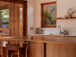 quiet luxury homes, material consistency homes, luxury home design trends, minimalist luxury residences, high-end home materials, understated luxury interiors, sustainable luxury houses, location-specific luxury homes, modern luxury architecture, premium material homes